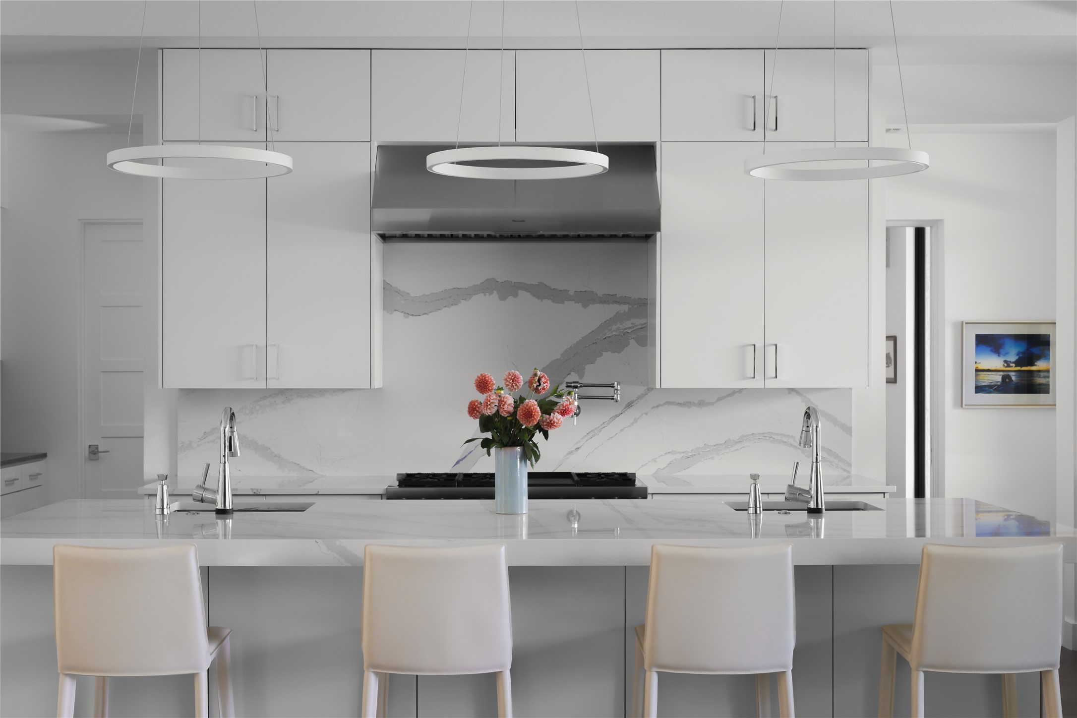 12900 Hacienda Ridge Austin, TX 78738 - Photo 13 of 40 a kitchen with cabinets a sink and white appliances