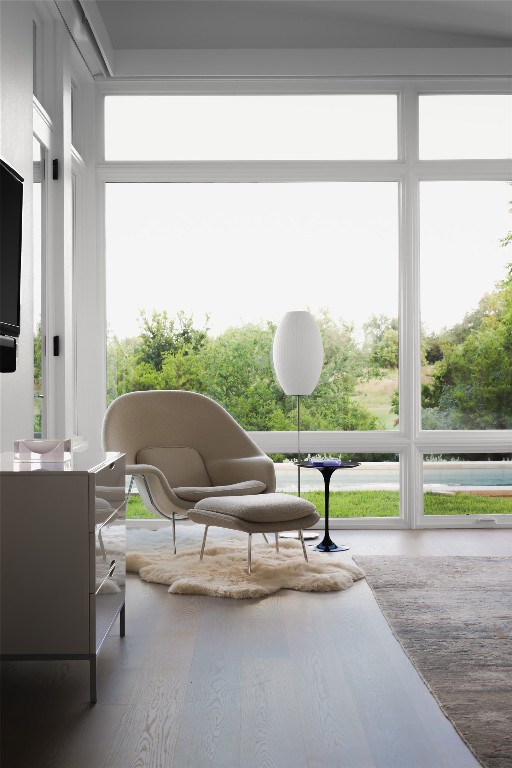 12900 Hacienda Ridge Austin, TX 78738 - Photo 19 of 40 a living room with a table and a large window