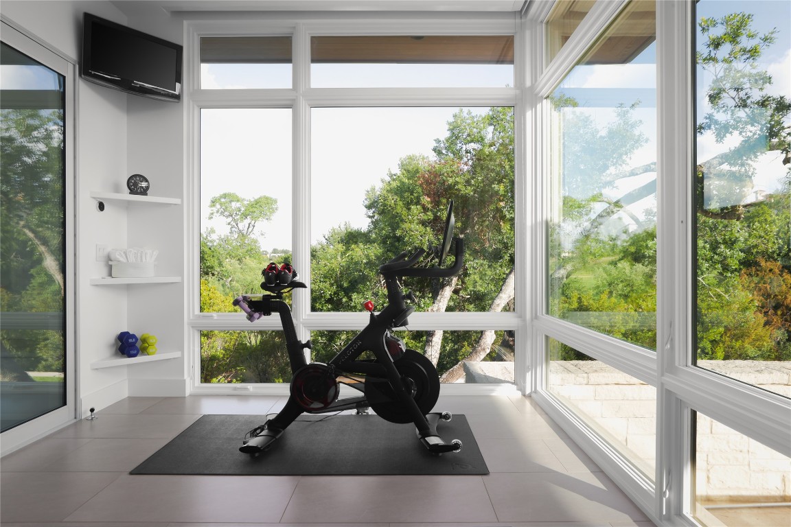 12900 Hacienda Ridge Austin, TX 78738 - Photo 24 of 40 a view of a living room and living room