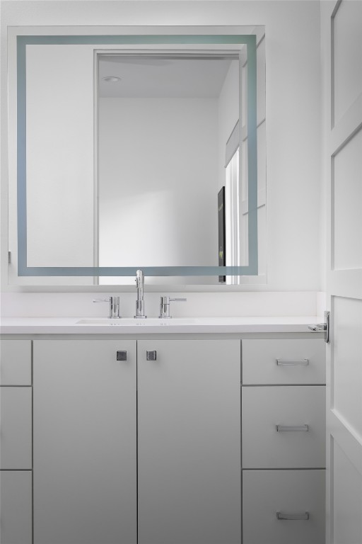 12900 Hacienda Ridge Austin, TX 78738 - Photo 28 of 40 a close view of sink and mirror