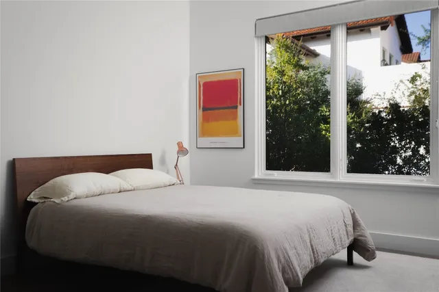 a bathroom with a bath tub and shower