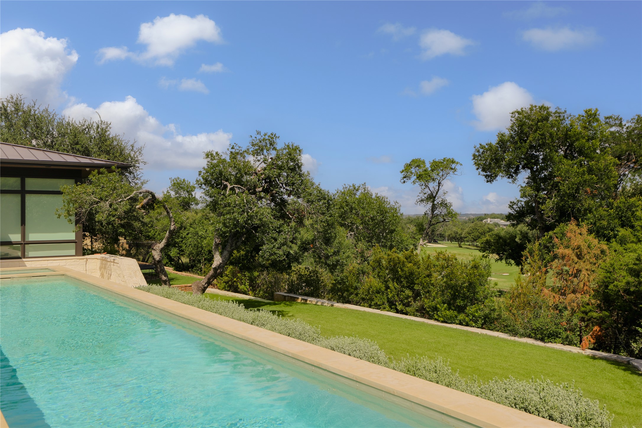 12900 Hacienda Ridge Austin, TX 78738 - Photo 34 of 40 a view of a backyard