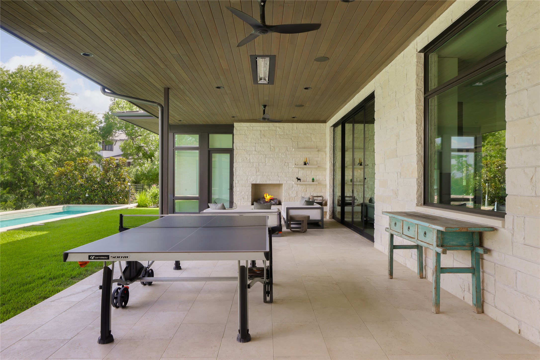 12900 Hacienda Ridge Austin, TX 78738 - Photo 38 of 40 a view of a patio with a table chairs and a swimming pool