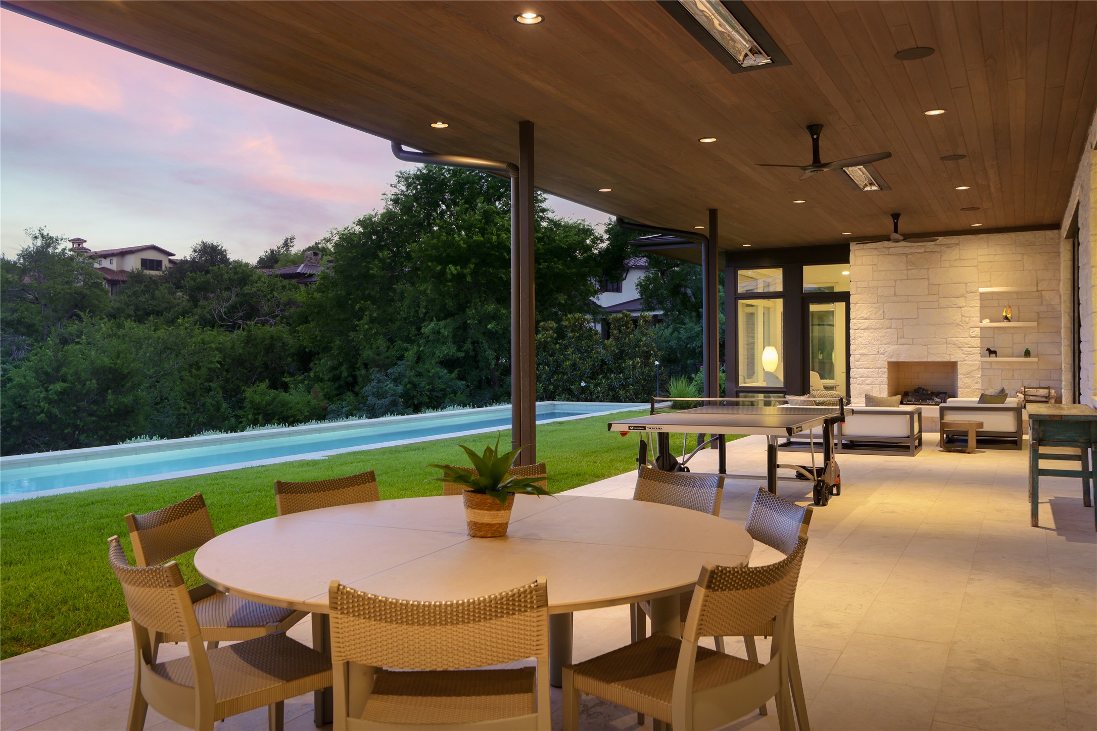 12900 Hacienda Ridge Austin, TX 78738 - Photo 39 of 40 a dining area with furniture and a garden