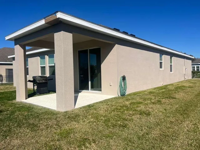 a house view with a garden space