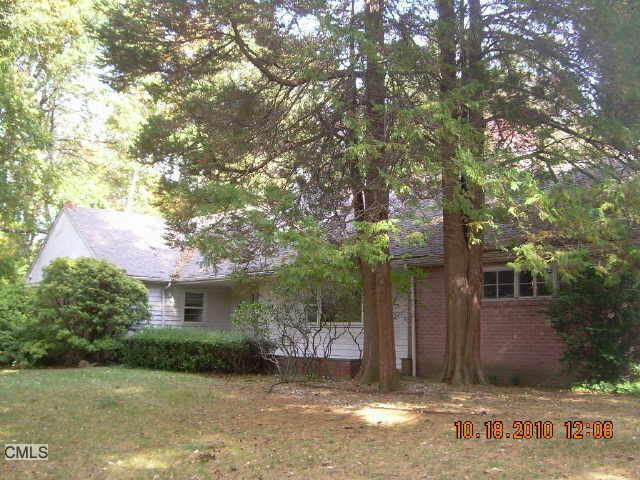 367 West Hill Road Stamford, CT 06902 - Photo 1 of 1 a view of a house with a yard
