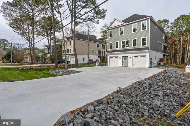 front view of a building with a yard