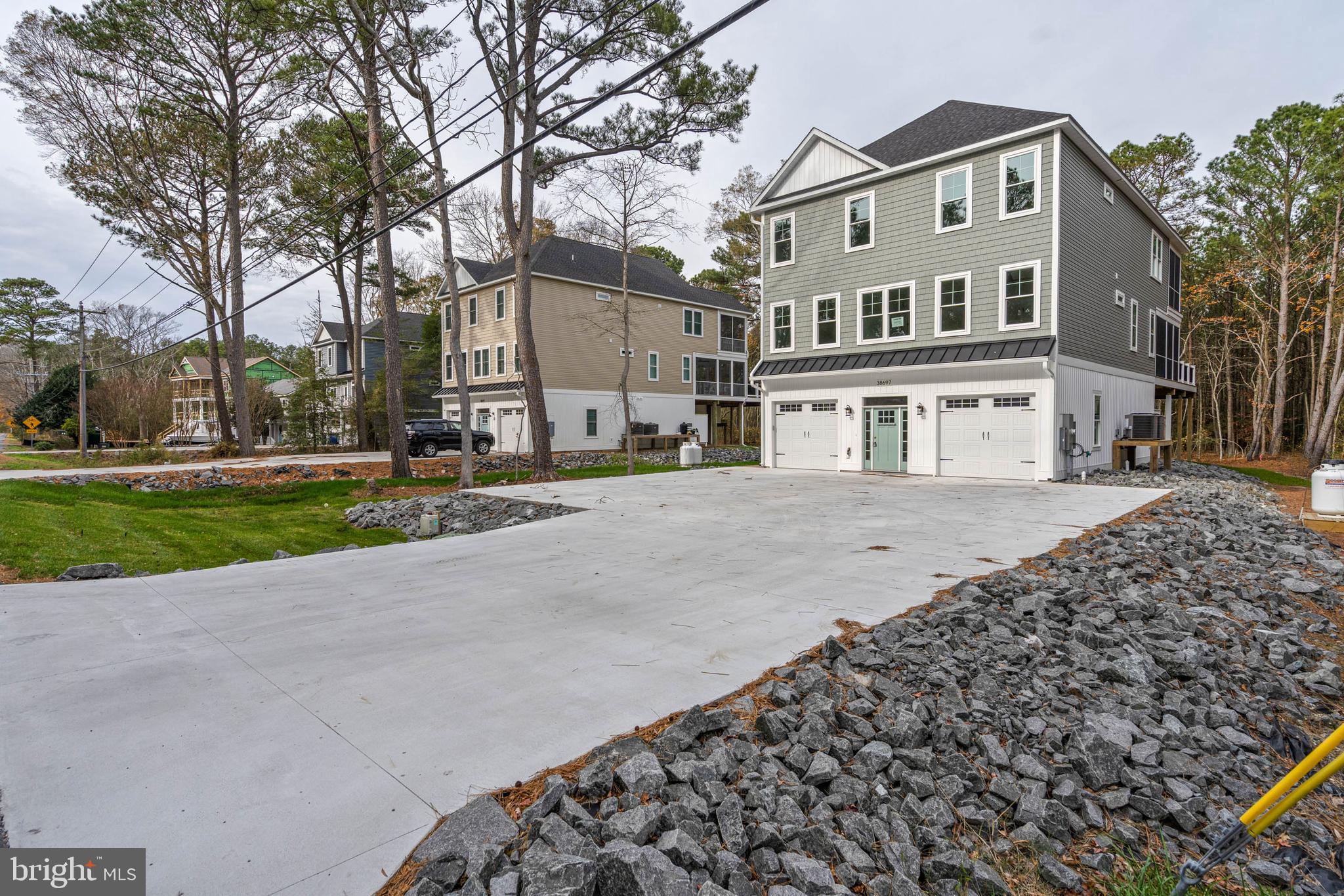 front view of a building with a yard