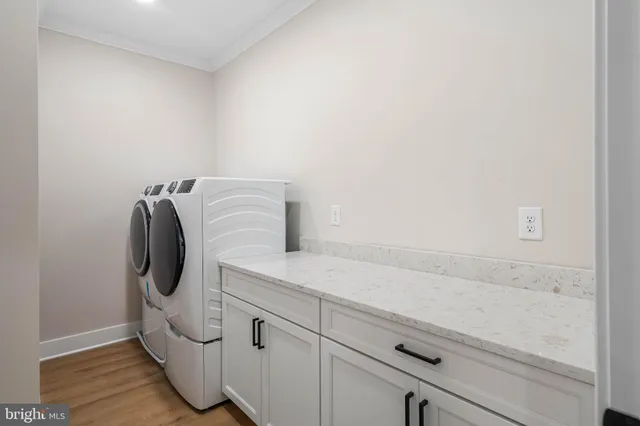 a utility room with cabinets