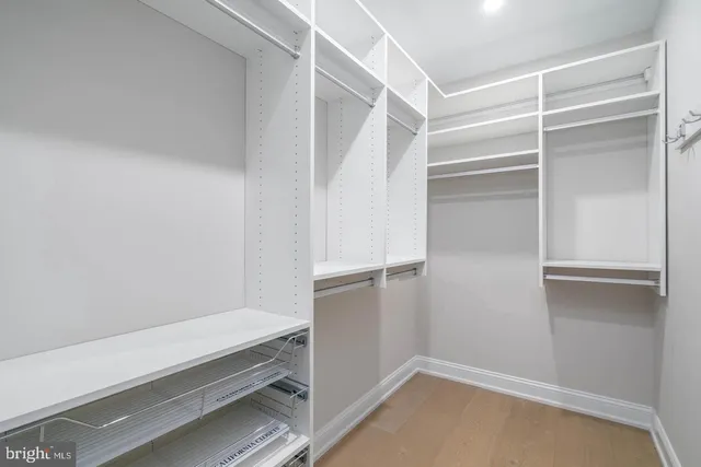 a view of an empty walk in closet