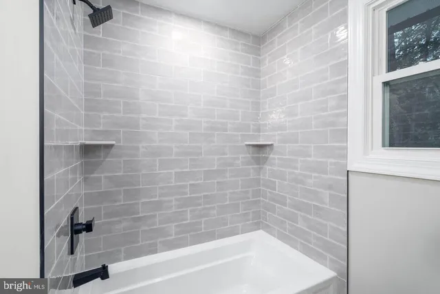 a bathroom with a bathtub