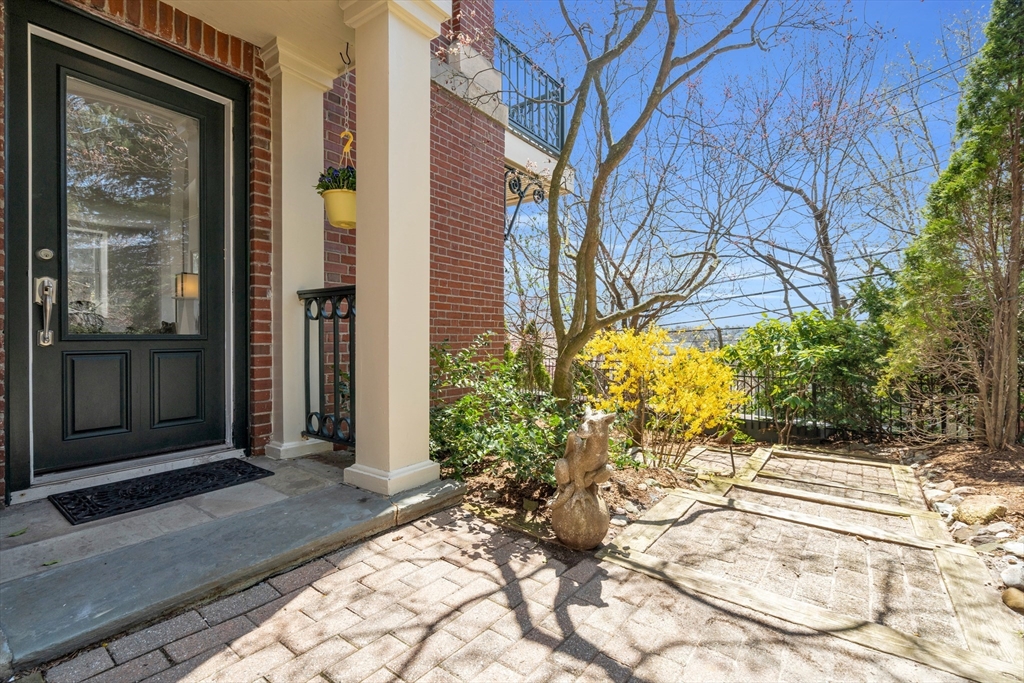 232 Summit Avenue, Unit A1 Brookline, MA 02446 - Photo 25 of 29 a view of a pathway with a yard