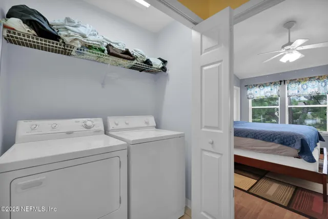 a utility room with dryer and washer