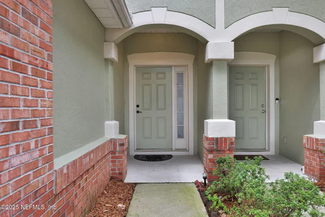 a spacious bathroom with a tub and shower
