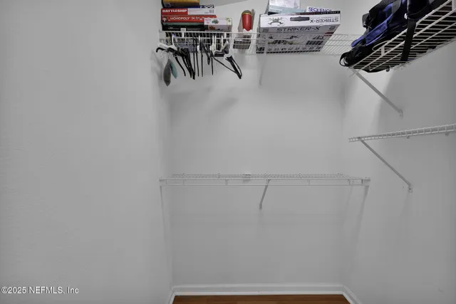 a view of small space with racks on the wall