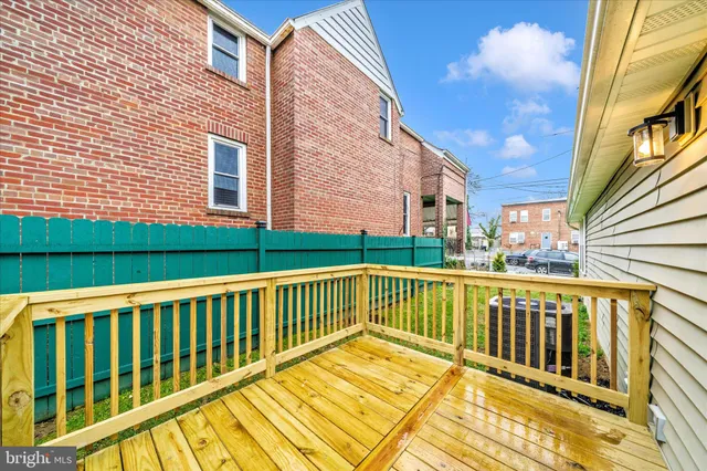 a view of a brick building from a balcony