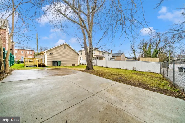 a view of backyard of a house