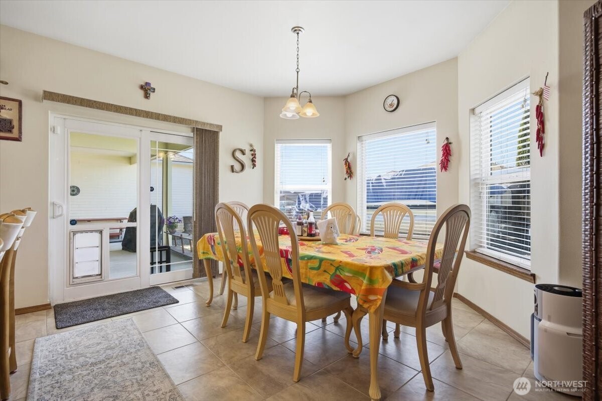2304 Road 52 Pasco, WA 99301 - Photo 12 of 39 a view of a dining room with furniture