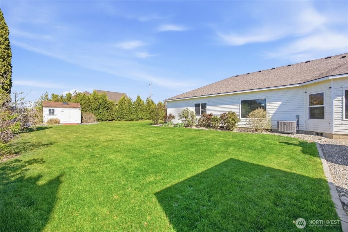 2304 Road 52 Pasco, WA 99301 - Photo 28 of 39 a view of house with backyard