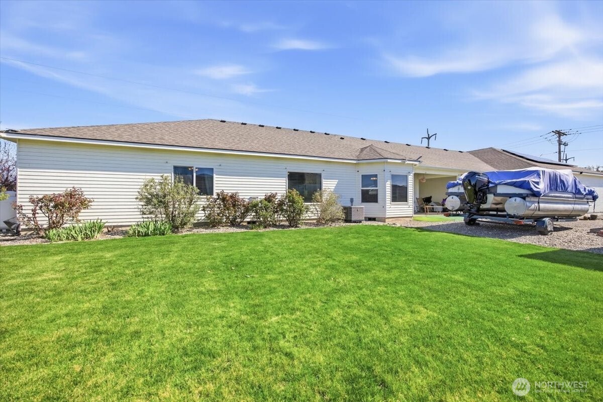 2304 Road 52 Pasco, WA 99301 - Photo 29 of 39 a view of a house with a back yard