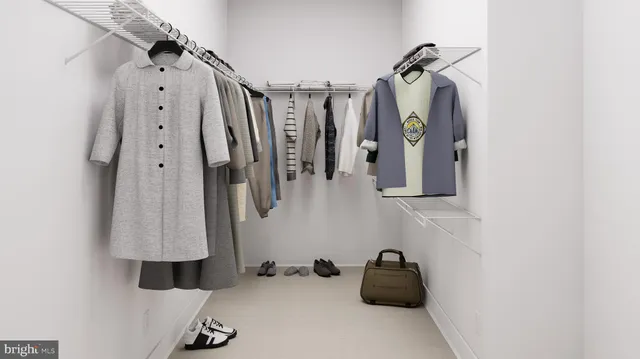 a room with a walk in closet and closet