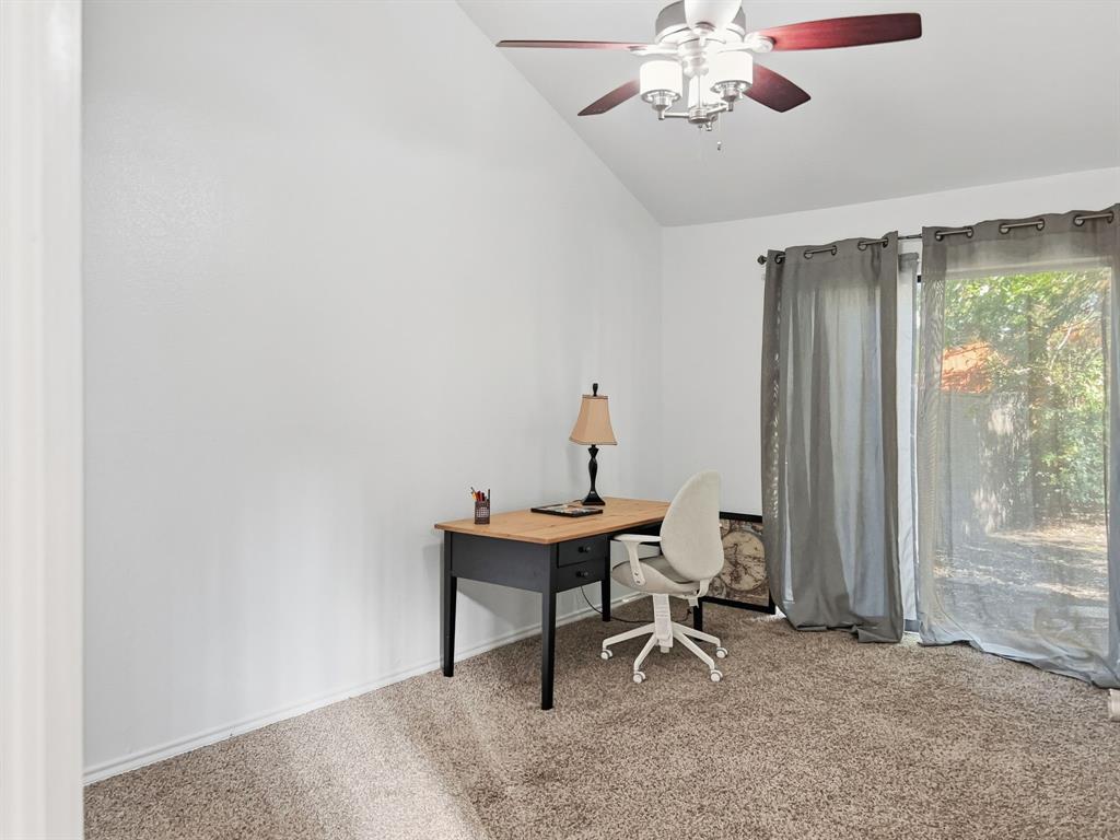 539 Ranch Trail, Unit 172 Irving, TX 75063 - Photo 24 of 40 a view of a workspace with furniture and a window