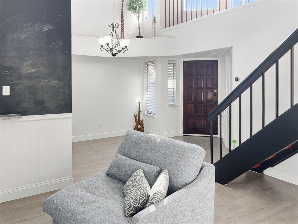 539 Ranch Trail, Unit 172 Irving, TX 75063 - Photo 5 of 40 a living room with furniture