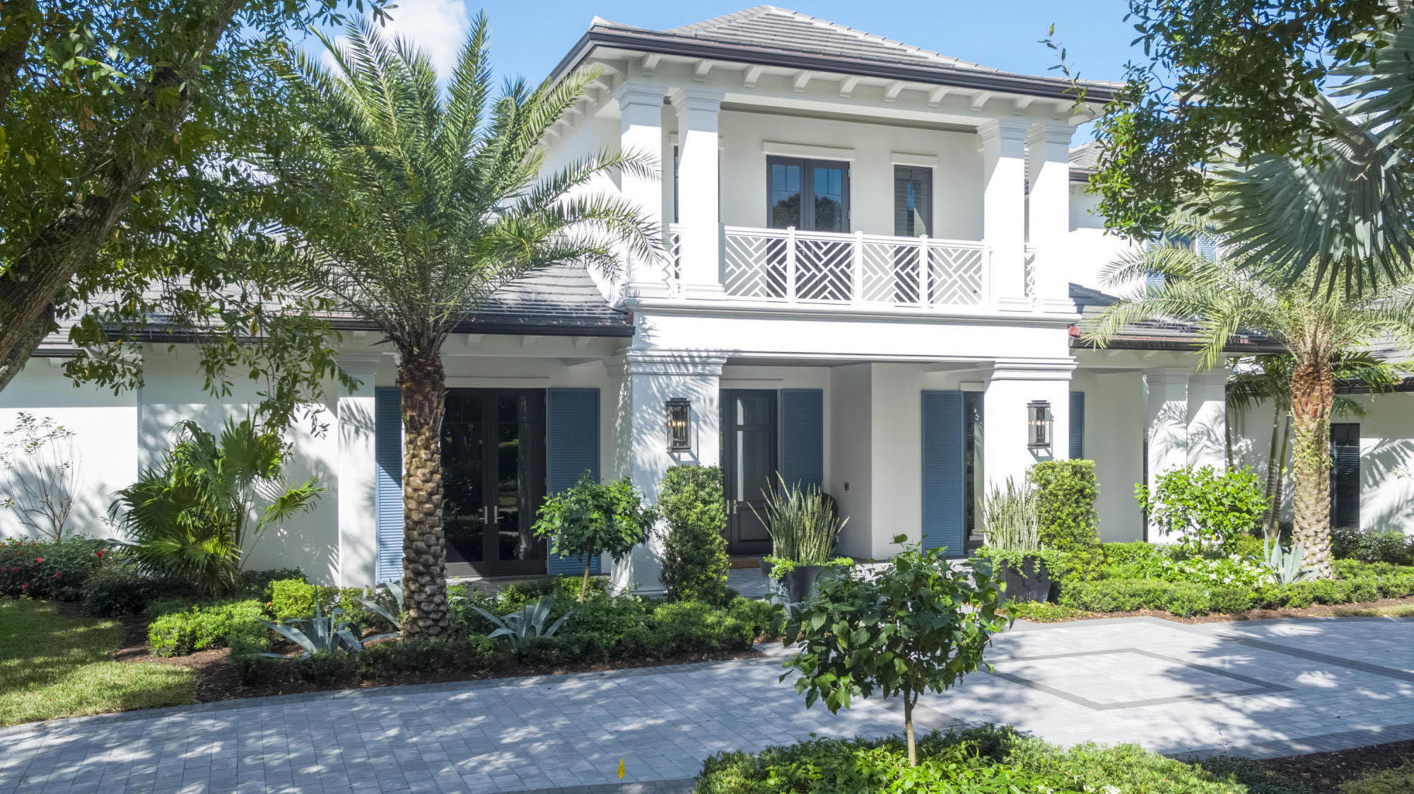 111 Clipper Lane Jupiter, FL 33477 - Photo 4 of 59 a front view of a house with garden