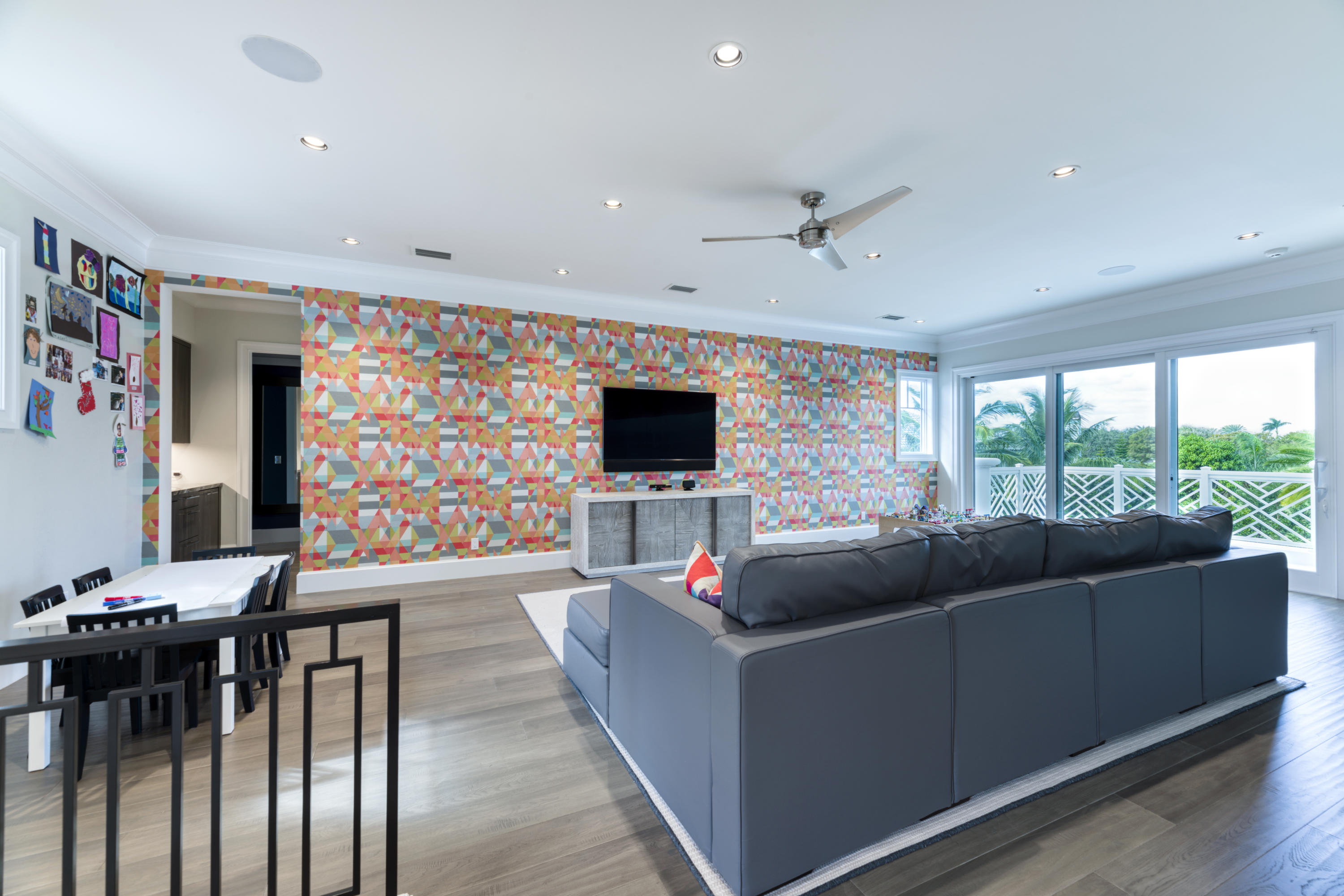 111 Clipper Lane Jupiter, FL 33477 - Photo 40 of 59 a living room with furniture and a flat screen tv