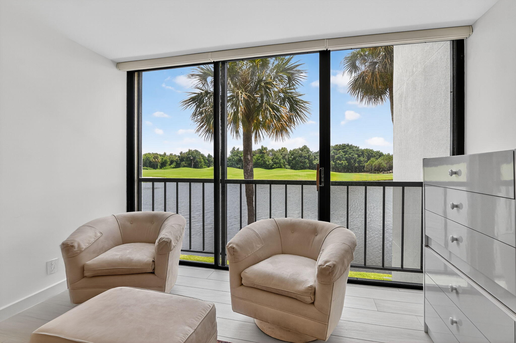 7768 Lakeside Boulevard, Unit 526 Boca Raton, FL 33434 - Photo 19 of 56 a living room with furniture and a large window