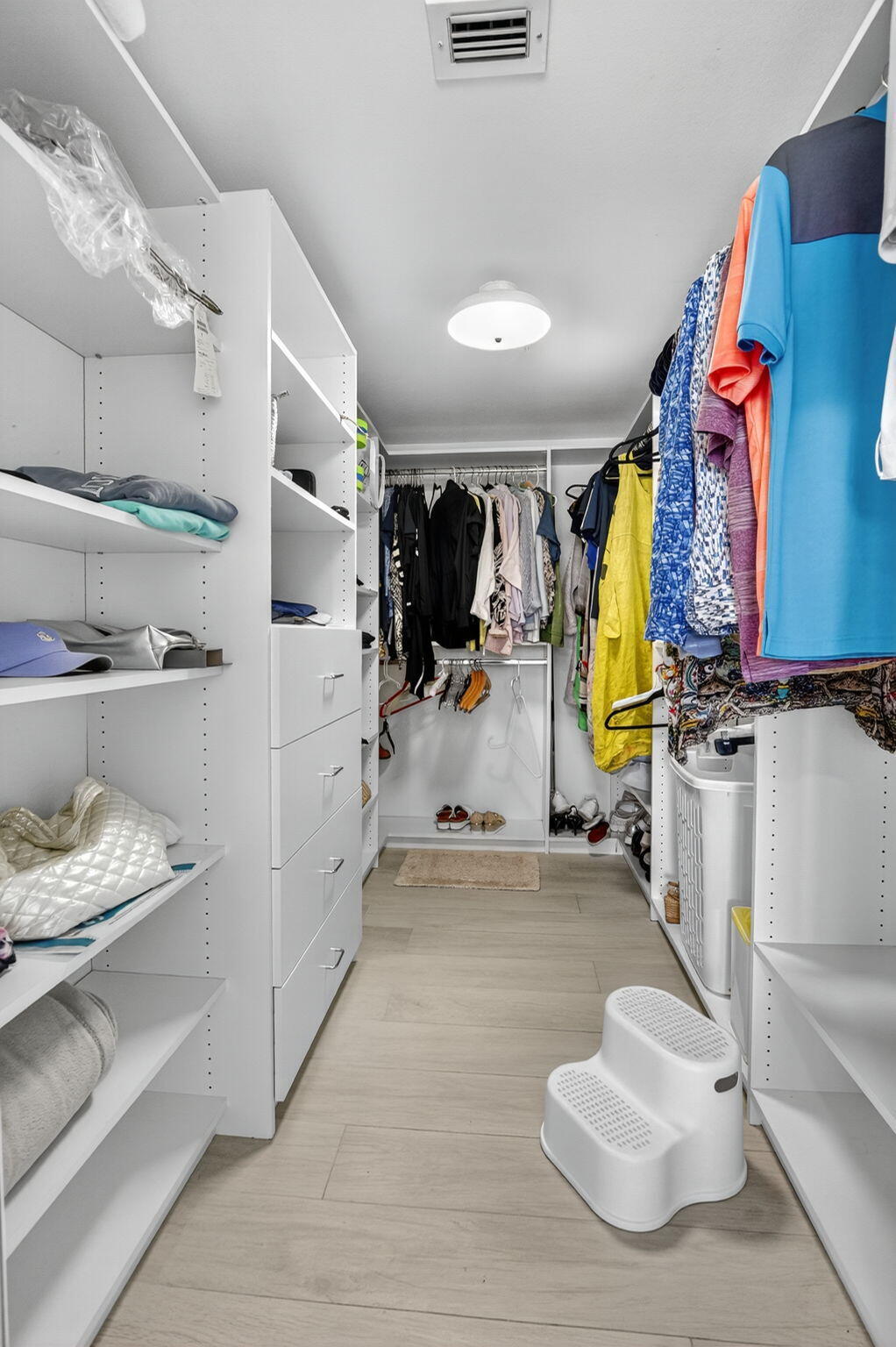 7768 Lakeside Boulevard, Unit 526 Boca Raton, FL 33434 - Photo 23 of 56 a view of open kitchen with furniture and a flat screen tv