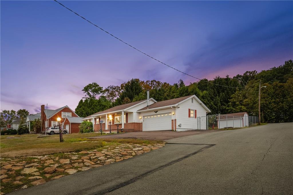 678 West Main Street Somerset, PA 15501 - Photo 1 of 38 a front view of a house with a yard