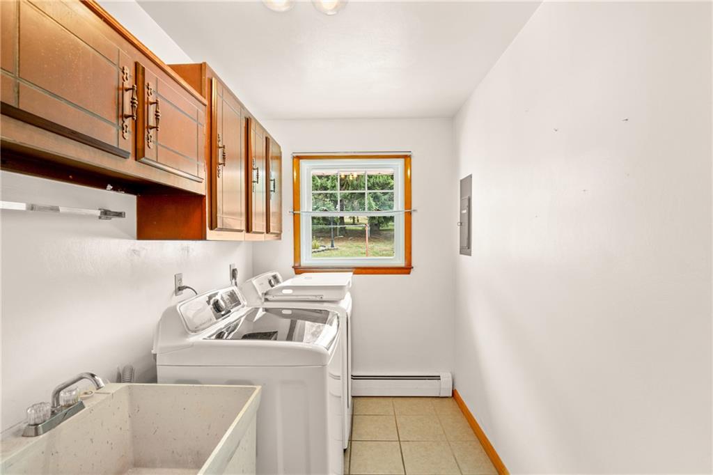 678 West Main Street Somerset, PA 15501 - Photo 15 of 38 a bathroom with a sink a bathtub and next to a window