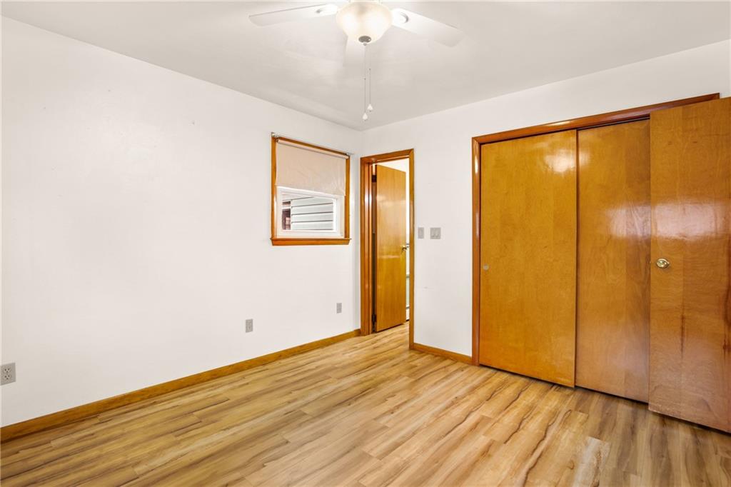 678 West Main Street Somerset, PA 15501 - Photo 19 of 38 a view of an empty room with wooden floor and a window