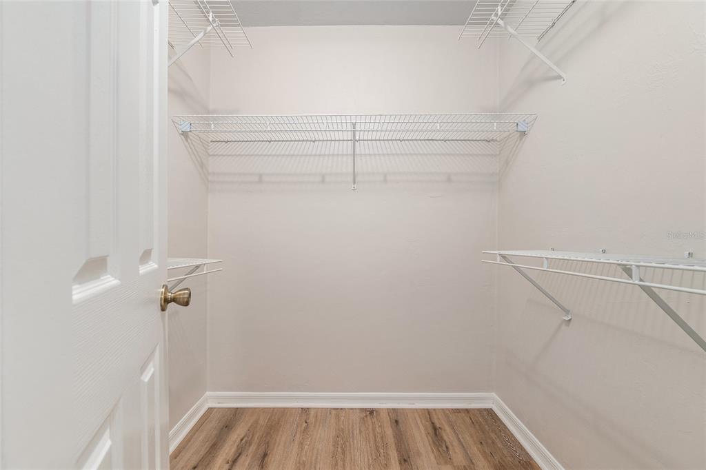 9755 Southwest 52nd Road Gainesville, FL 32608 - Photo 32 of 43 a view of a room with racks on the wall