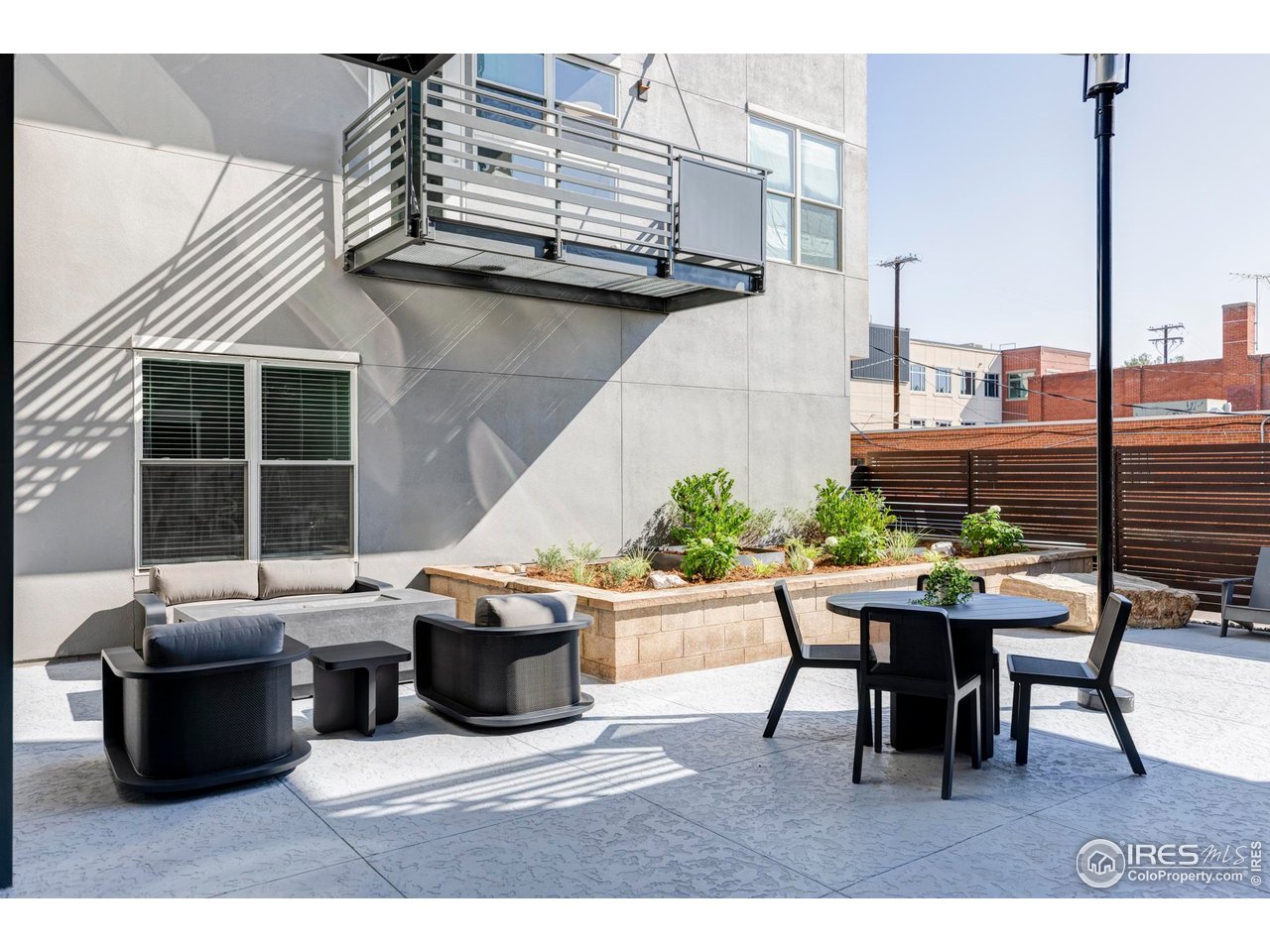1707 Walnut Street, Unit 207 Boulder, CO 80302 - Photo 11 of 23 a backyard of a house with outdoor seating
