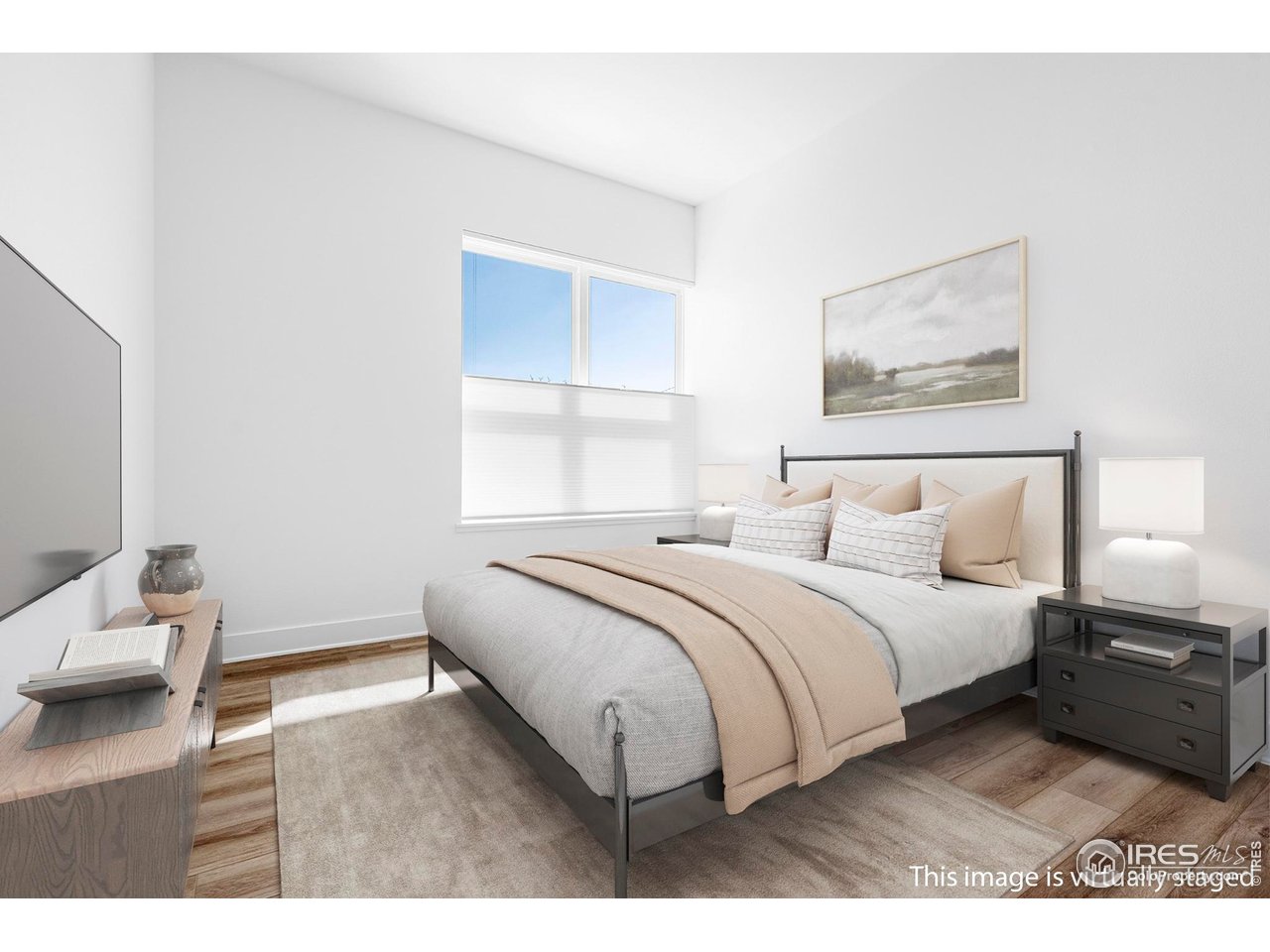 1707 Walnut Street, Unit 207 Boulder, CO 80302 - Photo 5 of 23 a bedroom with a bed and a window