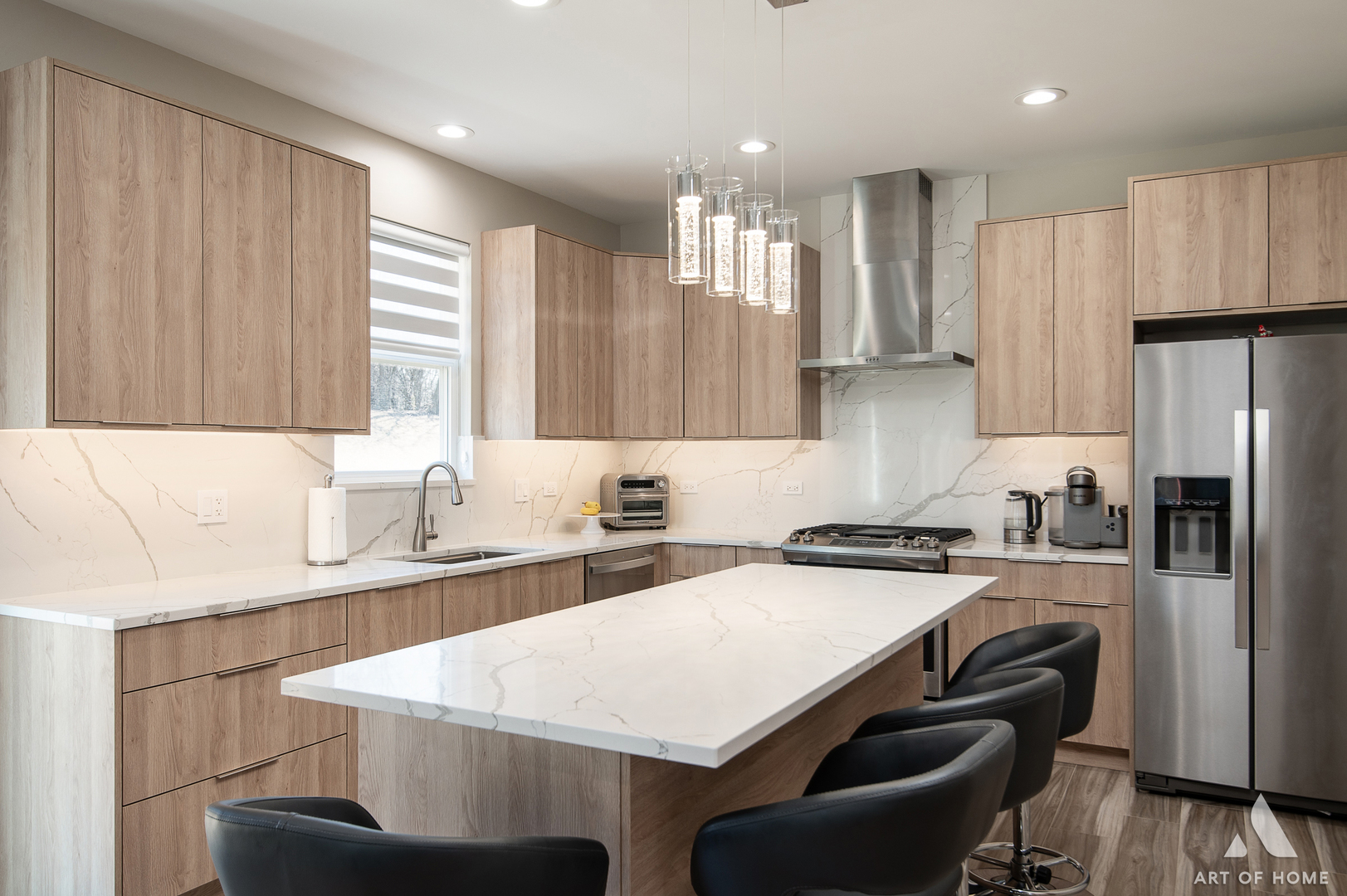 1007 Biltmore Drive Elgin, IL 60120 - Photo 12 of 43 a kitchen with stainless steel appliances a sink a stove a refrigerator and cabinets