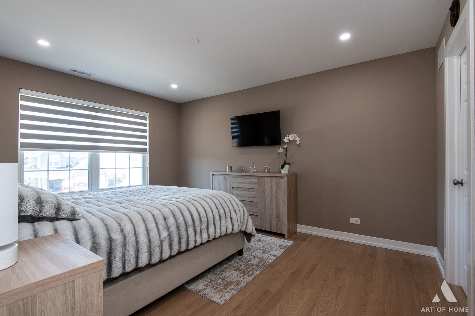 1007 Biltmore Drive Elgin, IL 60120 - Photo 19 of 43 a bedroom with a bed and a flat screen tv