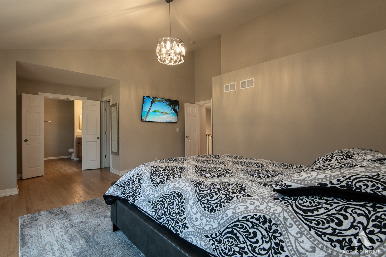 1007 Biltmore Drive Elgin, IL 60120 - Photo 22 of 43 a bedroom with a bed and a chandelier