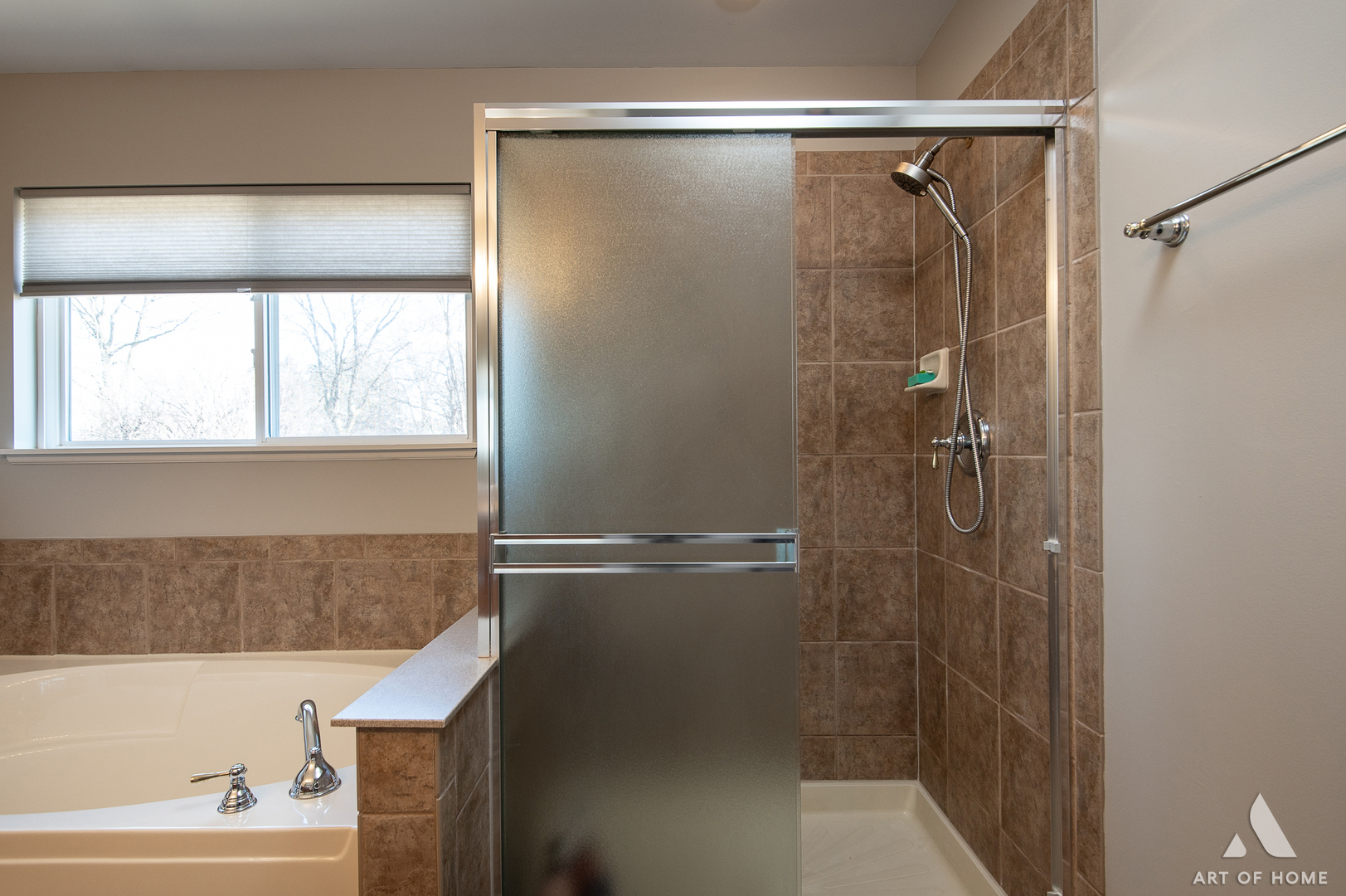 1007 Biltmore Drive Elgin, IL 60120 - Photo 25 of 43 a bathroom with a shower and a window
