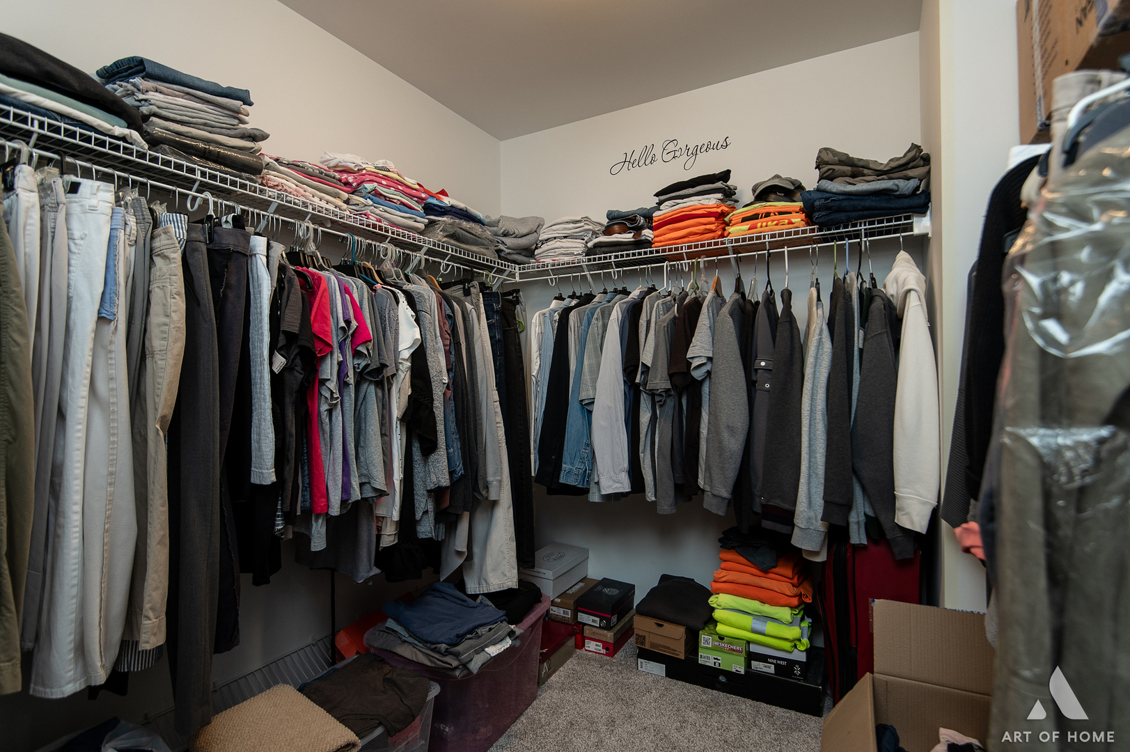 1007 Biltmore Drive Elgin, IL 60120 - Photo 26 of 43 a view of walk in closet with clothes and shoes