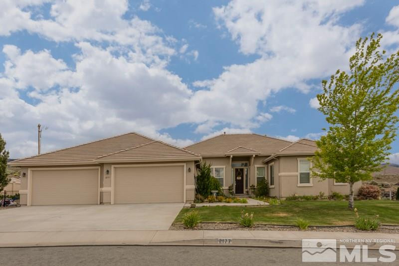 2177 South Tesuque Road Reno, NV 89511 - Photo 1 of 1 a front view of a house with garden