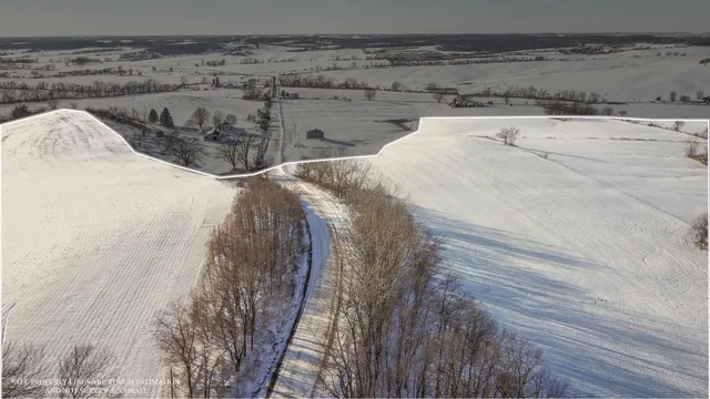 a view of storage and utility room with two wooden floor