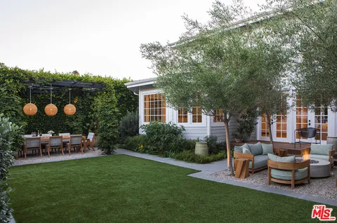 a view of a patio in backyard