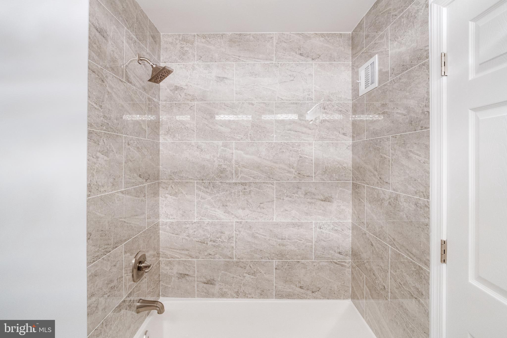 8913 Maplebrook Road Randallstown, MD 21133 - Photo 41 of 67 Hall Bath with Tile Surround