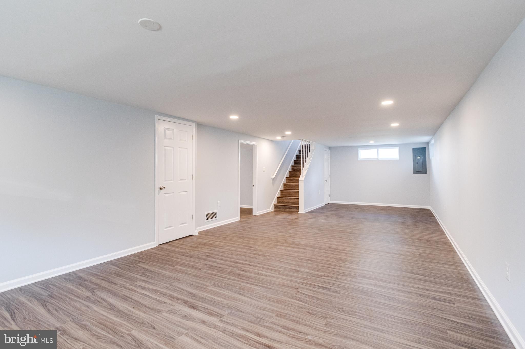 8913 Maplebrook Road Randallstown, MD 21133 - Photo 45 of 67 Lower Level with Laminate Hardwoods