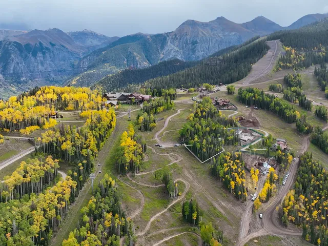 a view of a house with a mountain