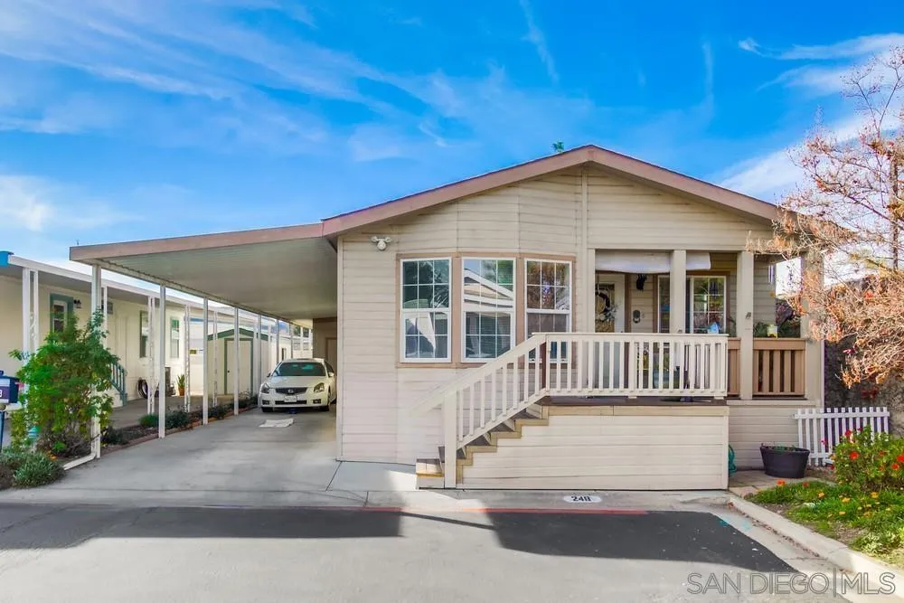 a view of a house with a small garden