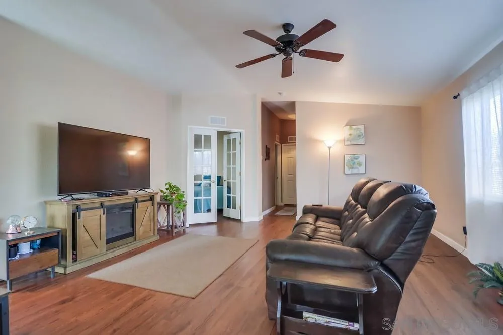 8301 Mission Gorge Road, Unit 248 Santee, CA 92071 - Photo 11 of 24 a living room with furniture and a flat screen tv